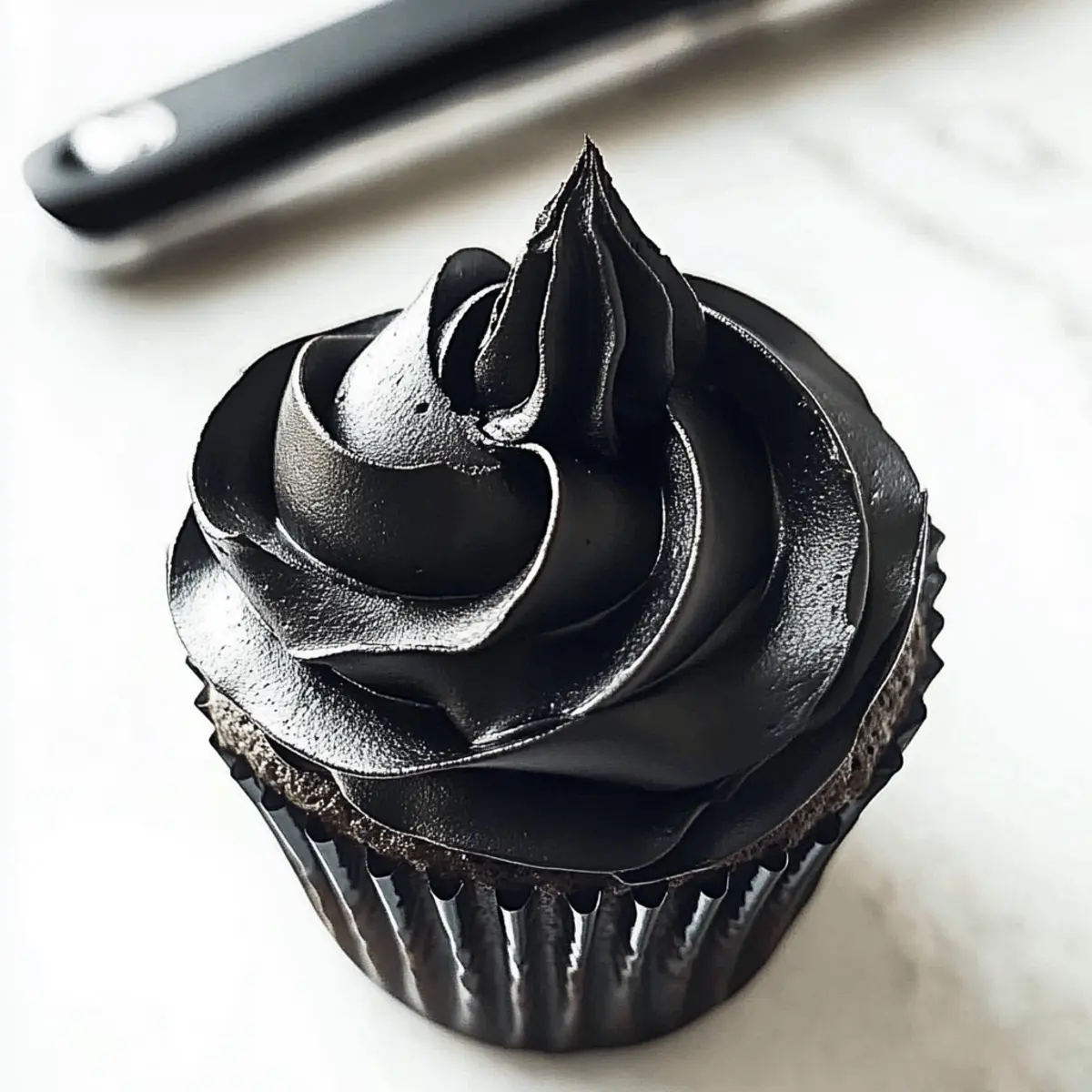 Decadent Black Buttercream Frosting for Spooky Treats